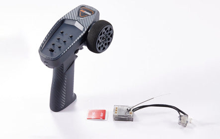 G3 transmitter with dual antenna and card for RC hobby, showcasing ergonomic design.