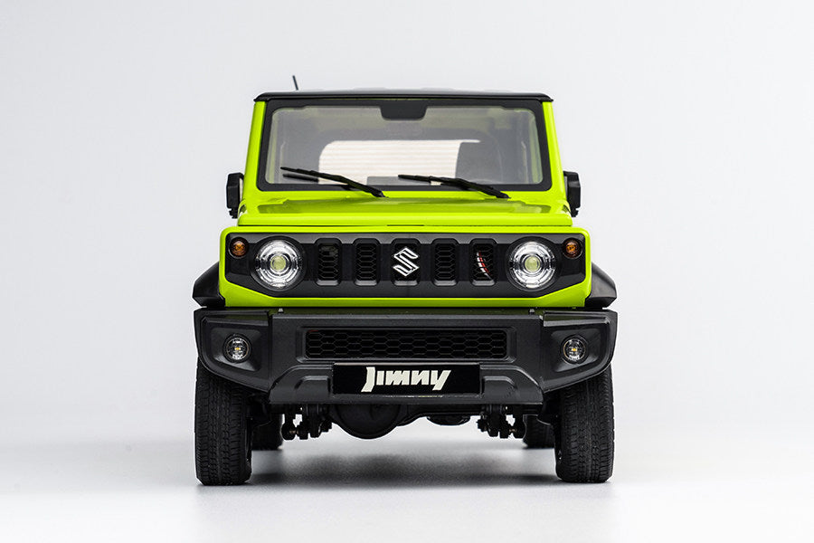 Front view of green 1:12 Suzuki Jimny RC model with detailed headlights and grille.