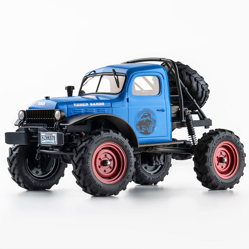 1:24 FMS Power Wagon RTR rock crawler in blue with large tires for rugged terrain.